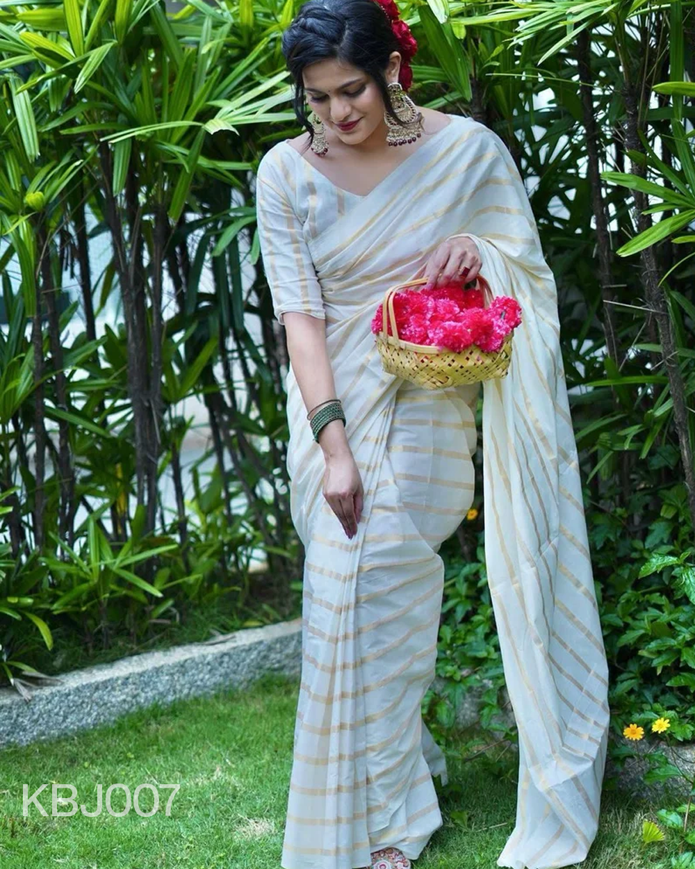 Cotton golden lines saree with tussels