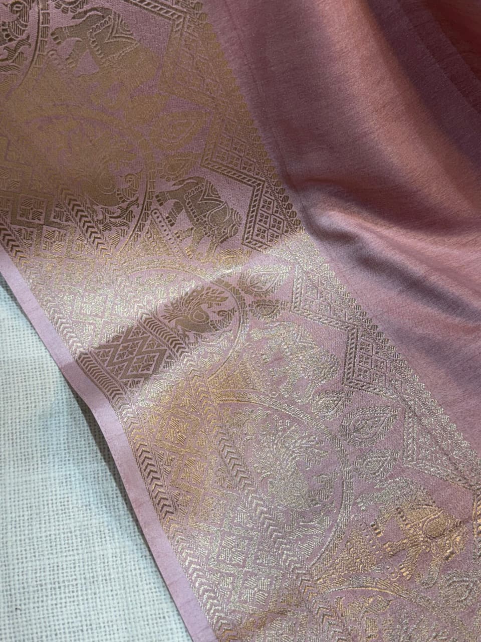 A classy light weight  pastal colors saree with touch of zari weaving jacquard
