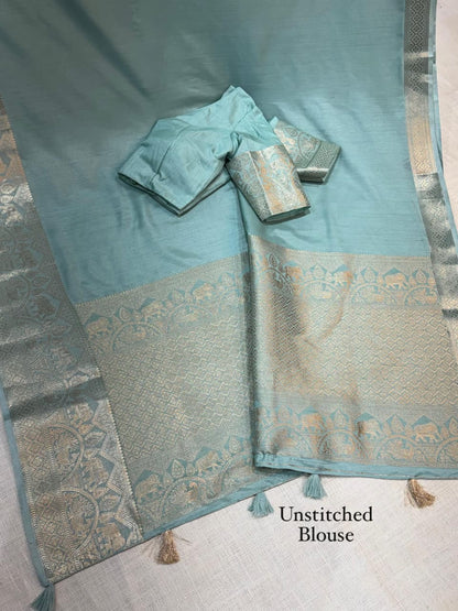 A classy light weight  pastal colors saree with touch of zari weaving jacquard