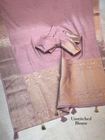 A classy light weight  pastal colors saree with touch of zari weaving jacquard