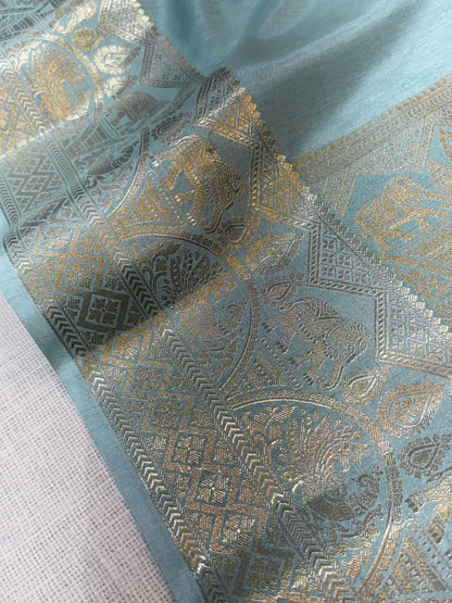 A classy light weight  pastal colors saree with touch of zari weaving jacquard