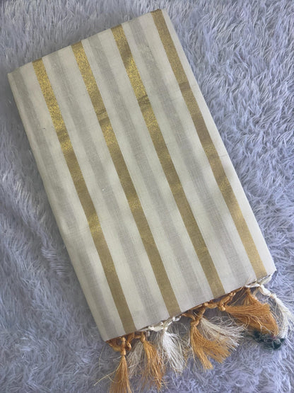 Cotton golden lines saree with tussels