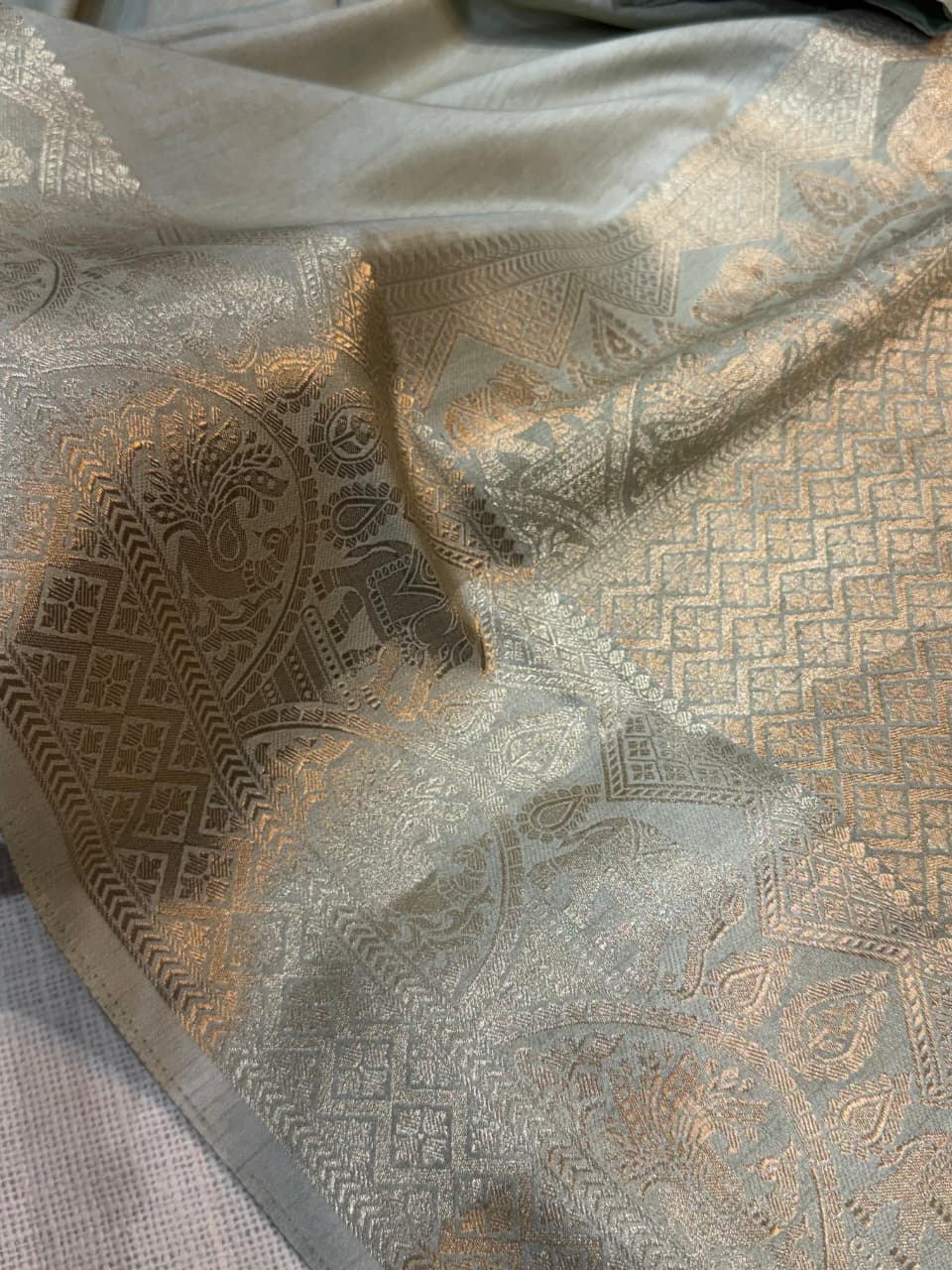 A classy light weight  pastal colors saree with touch of zari weaving jacquard