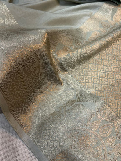 A classy light weight  pastal colors saree with touch of zari weaving jacquard