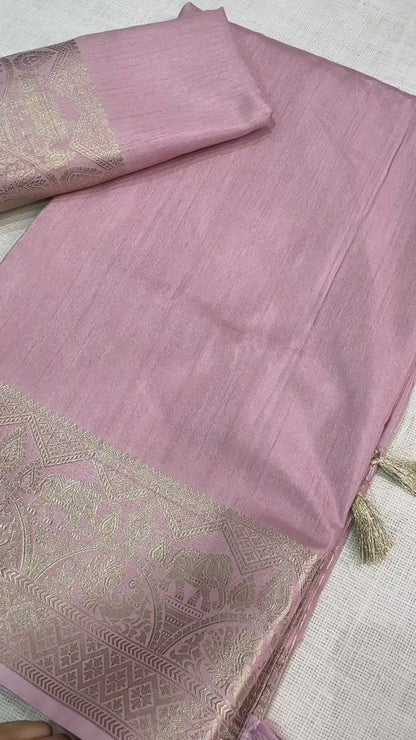 A classy light weight  pastal colors saree with touch of zari weaving jacquard